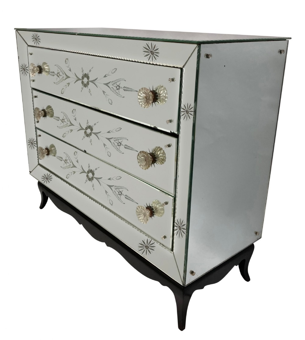 A French 1930s Art Deco chest of drawers featuring three etched mirrored glass drawers and a dark painted base with cabriole legs. View II