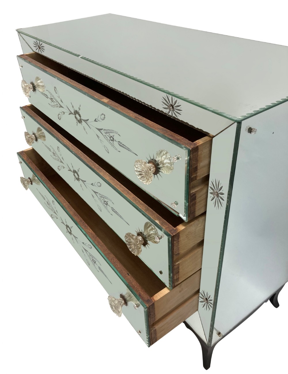 A French 1930s Art Deco chest of drawers featuring three etched mirrored glass drawers and a dark painted base with cabriole legs. View V