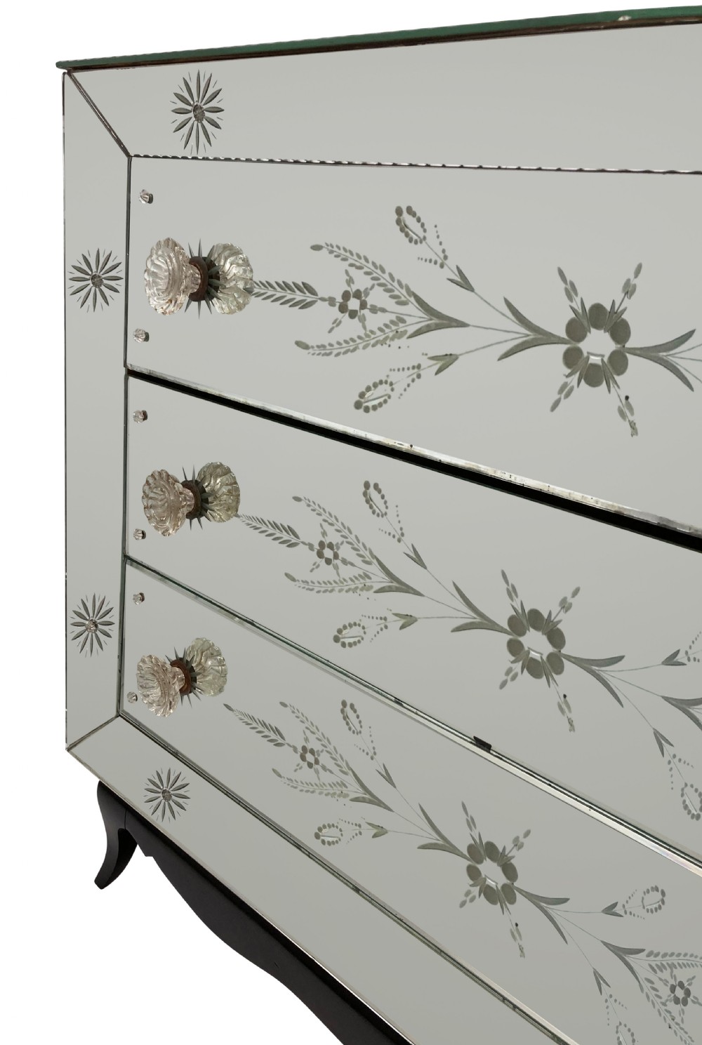 A French 1930s Art Deco chest of drawers featuring three etched mirrored glass drawers and a dark painted base with cabriole legs. View VII