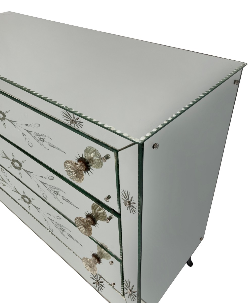 A French 1930s Art Deco chest of drawers featuring three etched mirrored glass drawers and a dark painted base with cabriole legs. View VIII