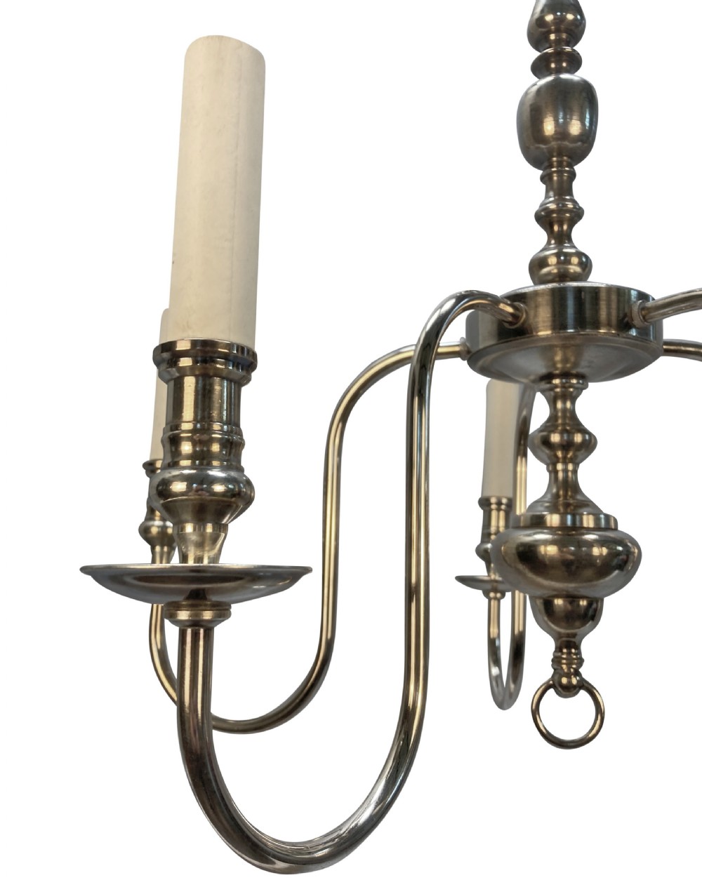 An Edwardian silver-plated five-arm chandelier featuring a turned central baluster column, sweeping curved arms, and candle sleeves. View III