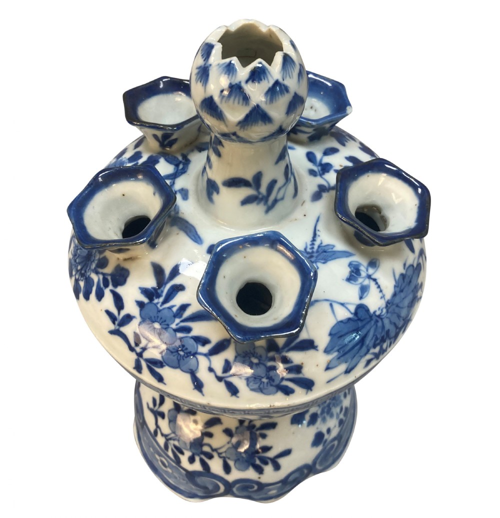 A blue and white Chinese porcelain tulipiere featuring floral and dragon underglaze motifs with multiple spout apertures surrounding a central finial. View VII