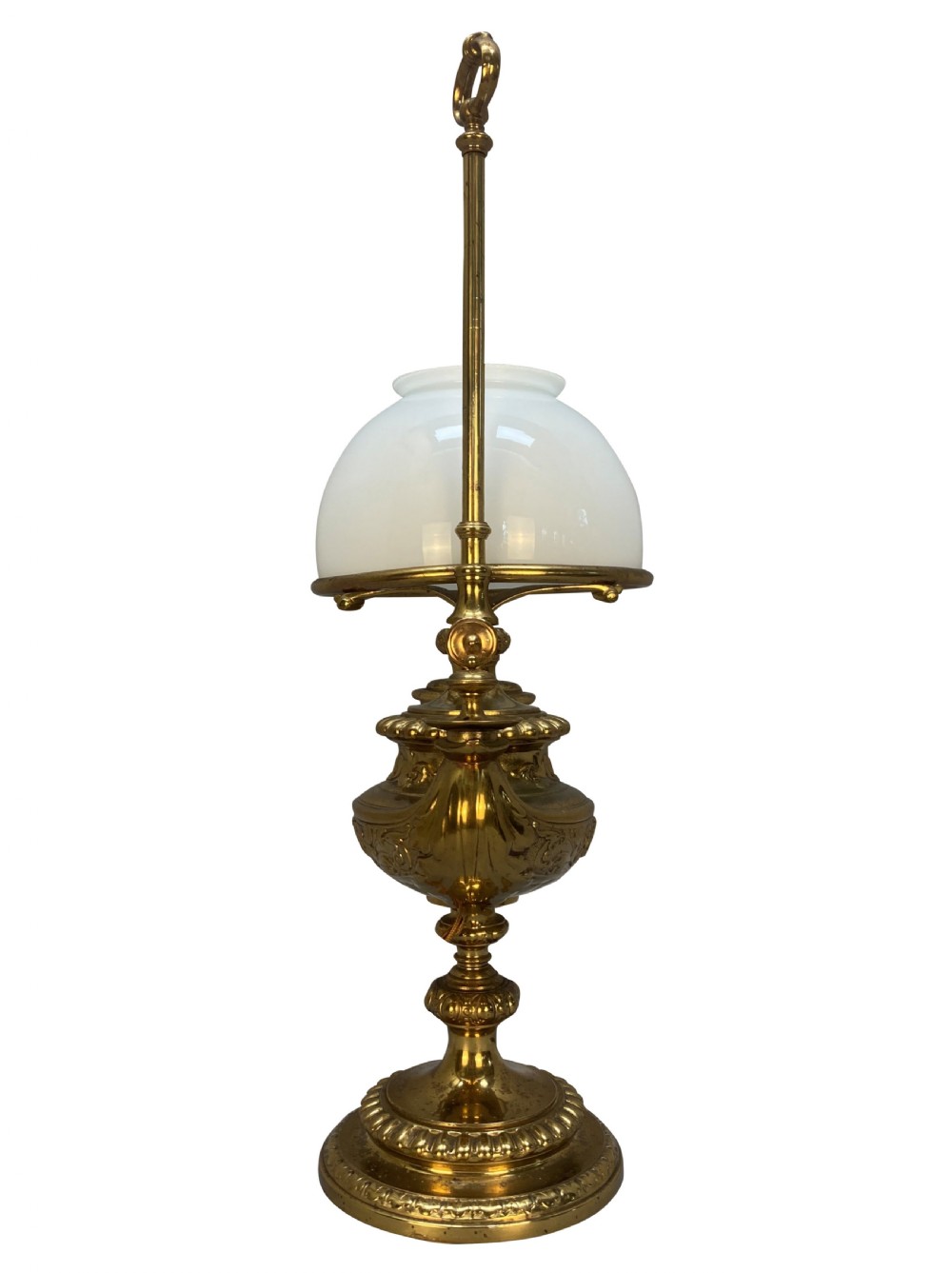 A pair of ornate 19th-century brass desk lamps featuring elaborate cast detail, tall central adjustment poles with ring finials, and white domed glass shades. View IV