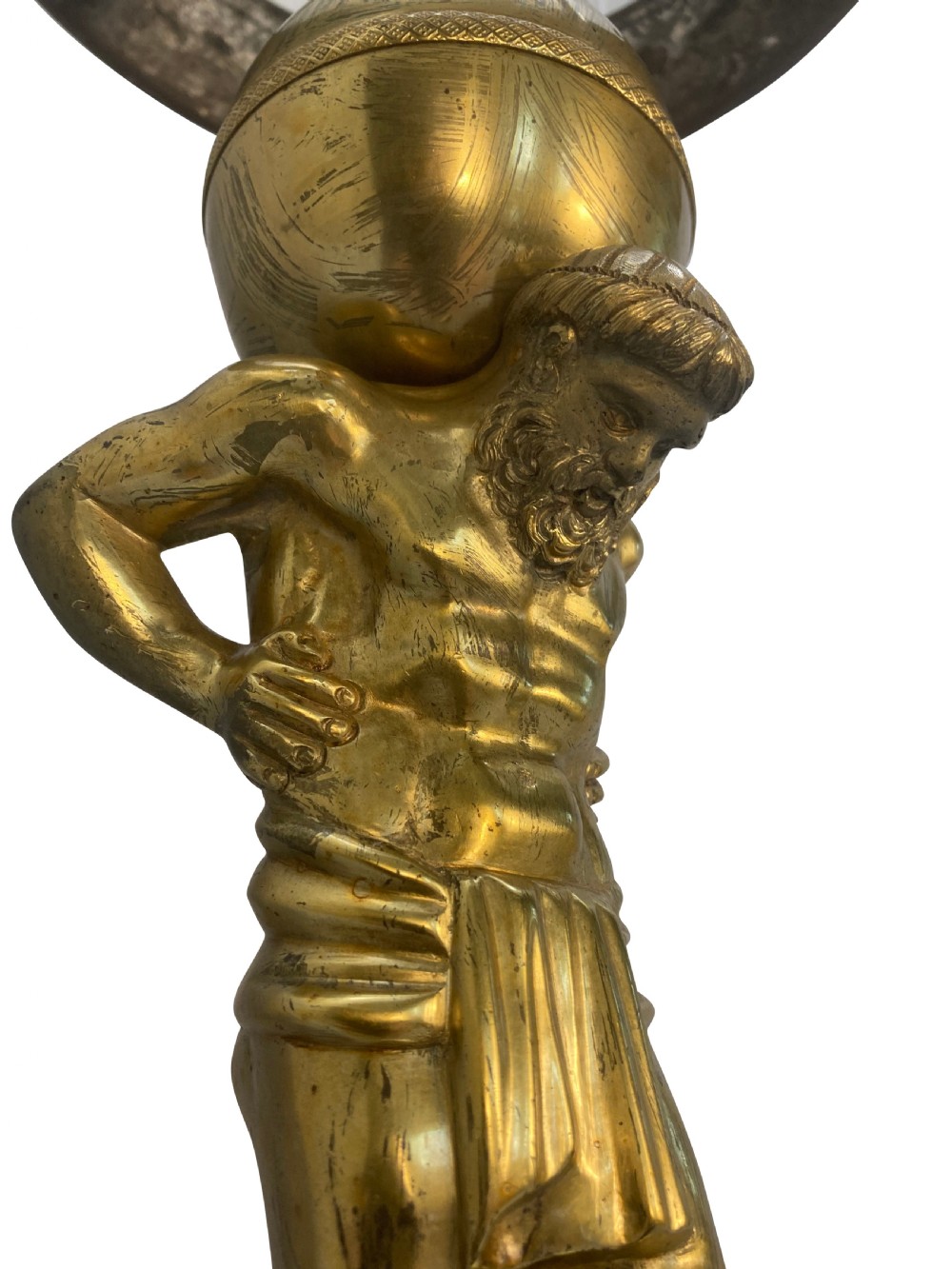 An English Regency gilt-bronze table lamp featuring a figure of Atlas supporting a sphere beneath a frosted glass dome shade. View IV