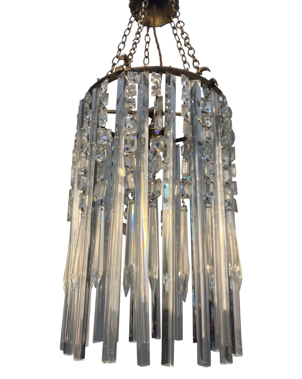 An antique cut glass waterfall pendant light featuring layered clear glass drops suspended from brass chains. View II