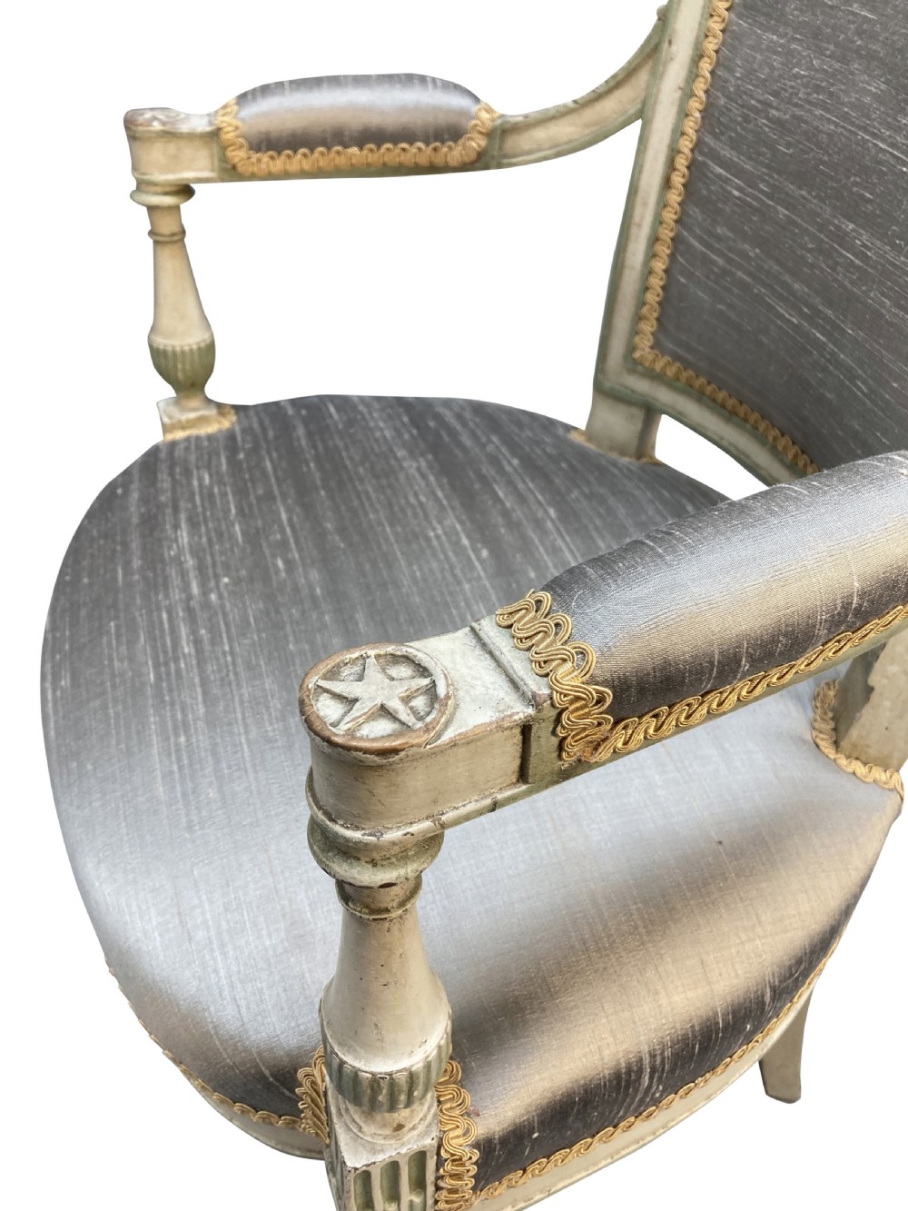 A pair of French Directoire style painted armchairs with grey silk upholstery, fluted legs, and cream-painted frames. View V