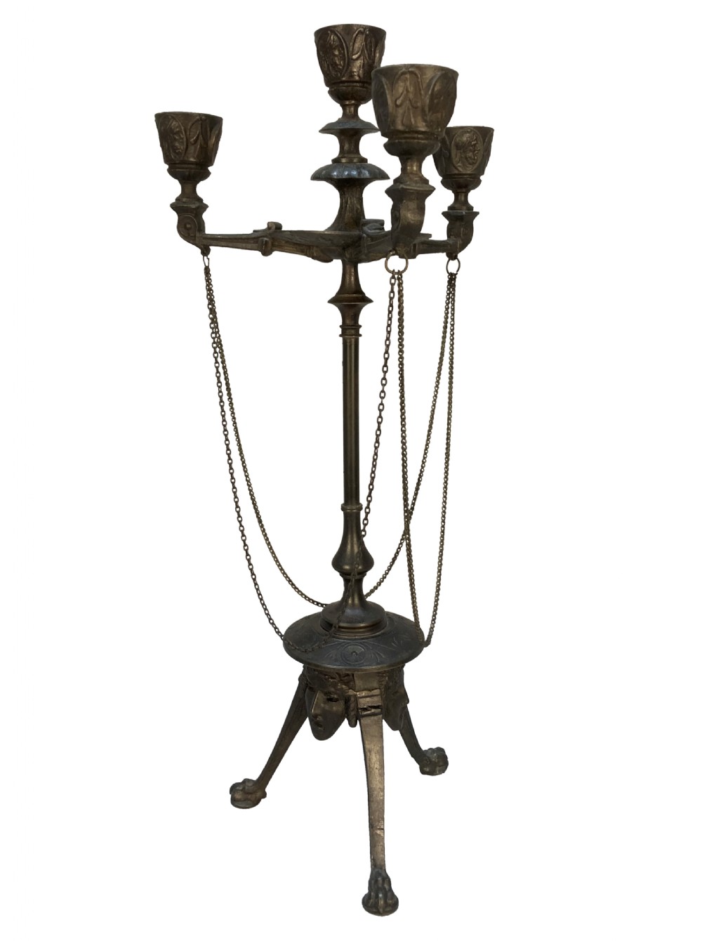 A pair of 19th-century dark bronze three-light candelabra with draped metal chains, classical face masks, and tripod bases ending in claw feet. View III