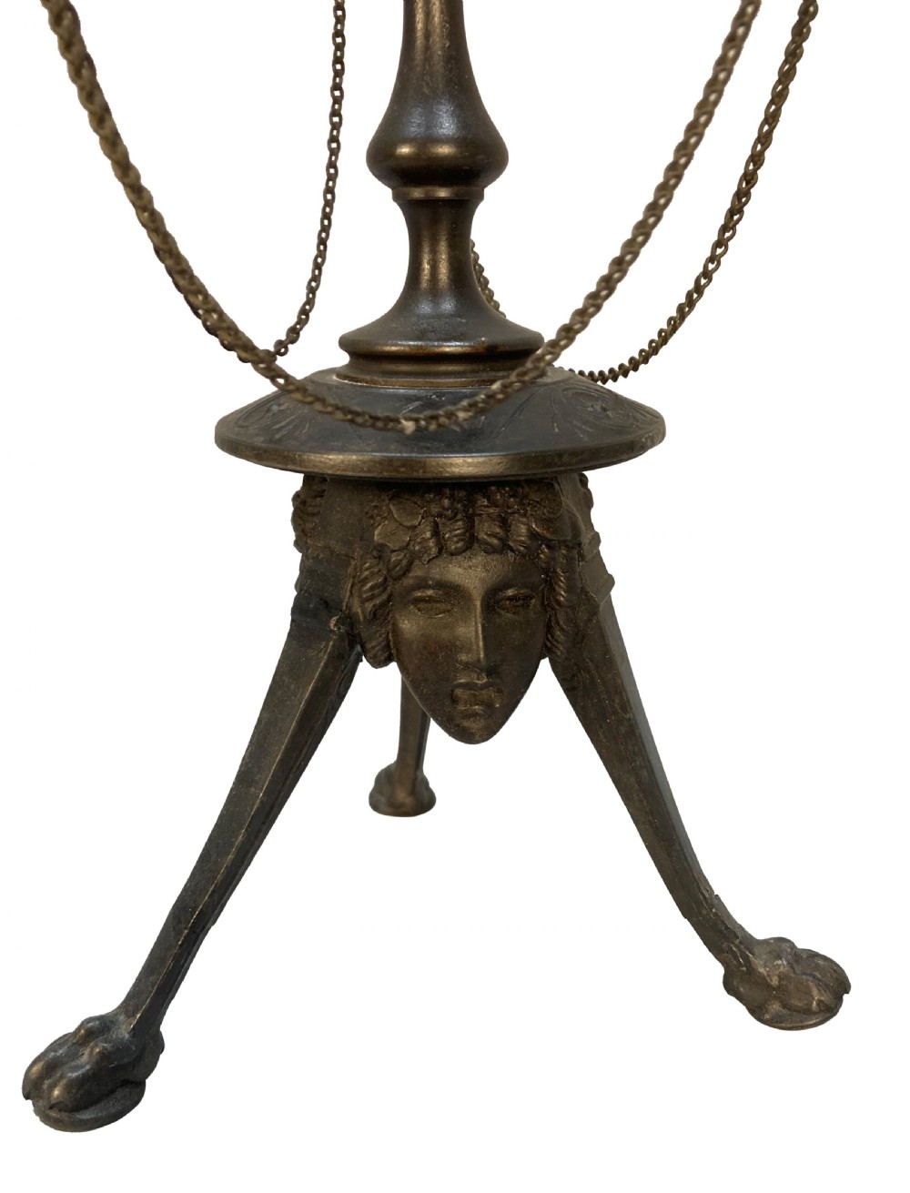 A pair of 19th-century dark bronze three-light candelabra with draped metal chains, classical face masks, and tripod bases ending in claw feet. View IV