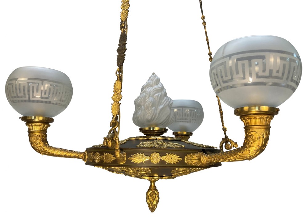 A Regency period gilt and patinated bronze colza hanging light featuring etched frosted glass shades with Greek key motifs. View III