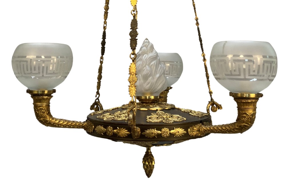 A Regency period gilt and patinated bronze colza hanging light featuring etched frosted glass shades with Greek key motifs. View VIII