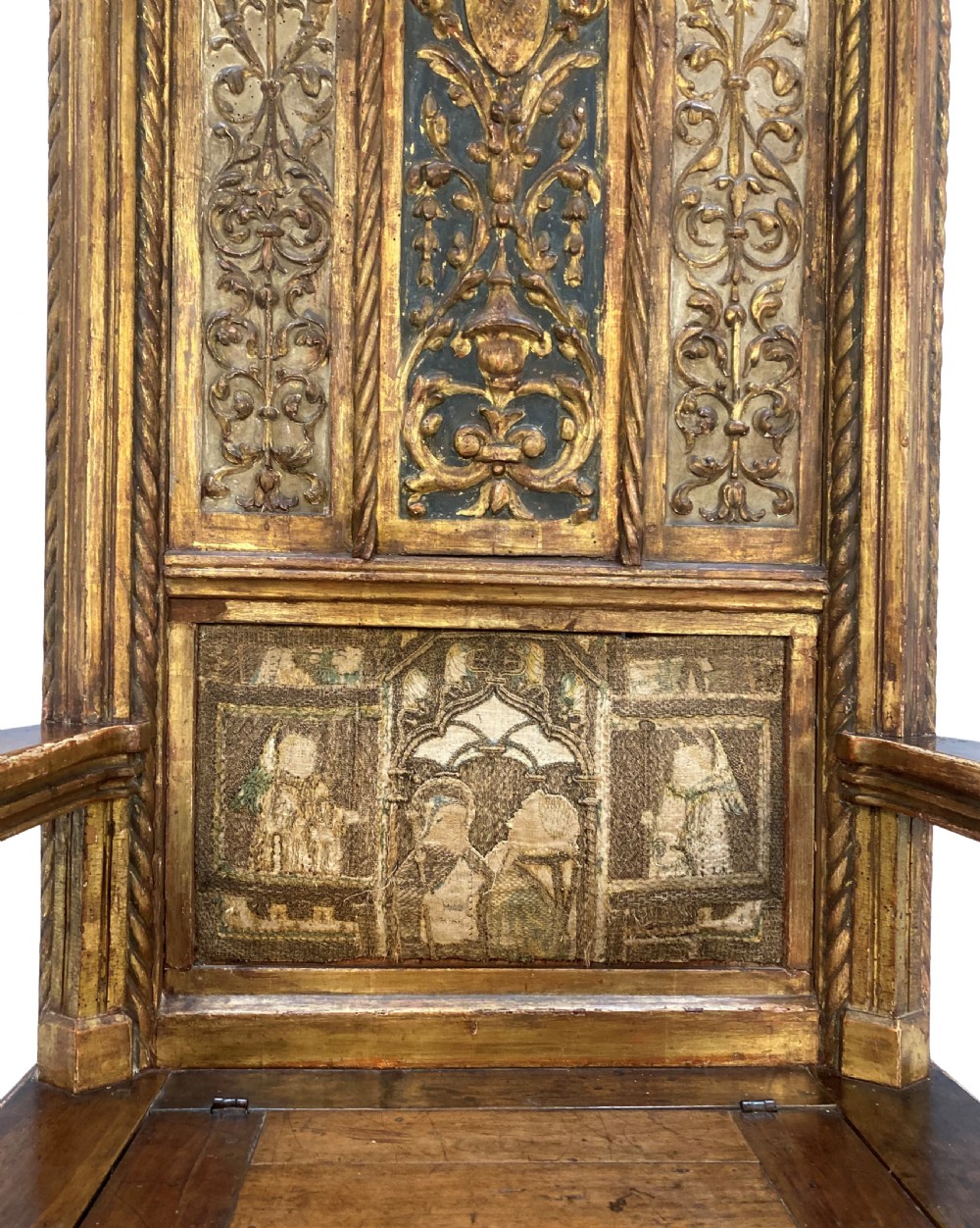 A tall 15th-century carved oak ecclesiastical throne featuring elaborate Gothic tracery, a decorative canopy, and gilded details. View VI