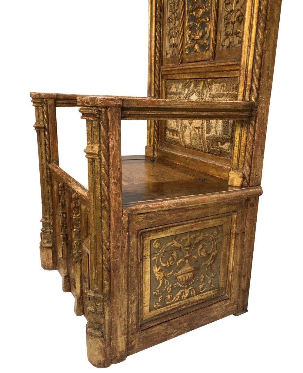 A tall 15th-century carved oak ecclesiastical throne featuring elaborate Gothic tracery, a decorative canopy, and gilded details. View XII