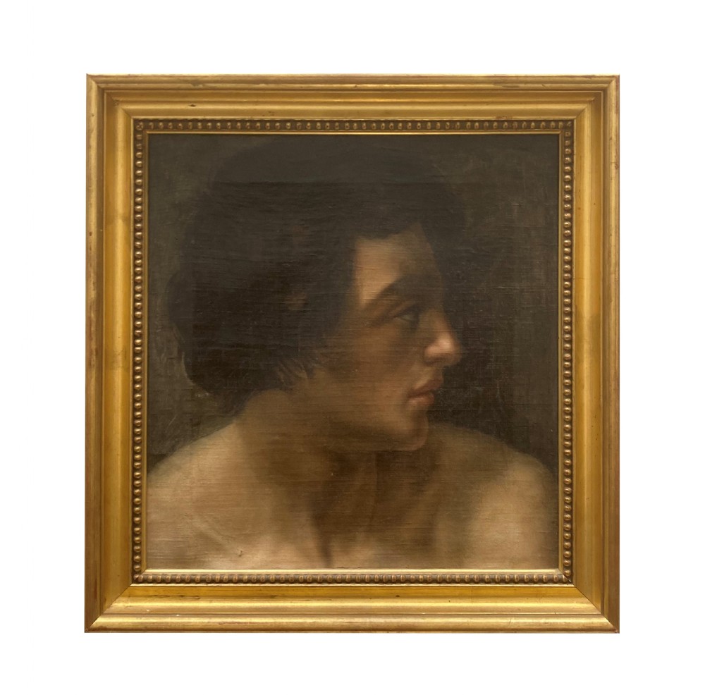 A late seventeenth-century oil portrait painting depicting the profile of a young man with dark curly hair set inside a molded gilt frame.