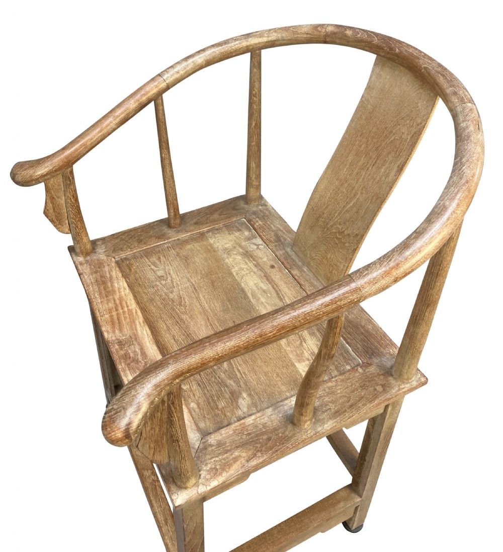 A pair of light brown pickled elm Chinese horseshoe armchairs featuring continuous curved crest rails and central back splats. View V