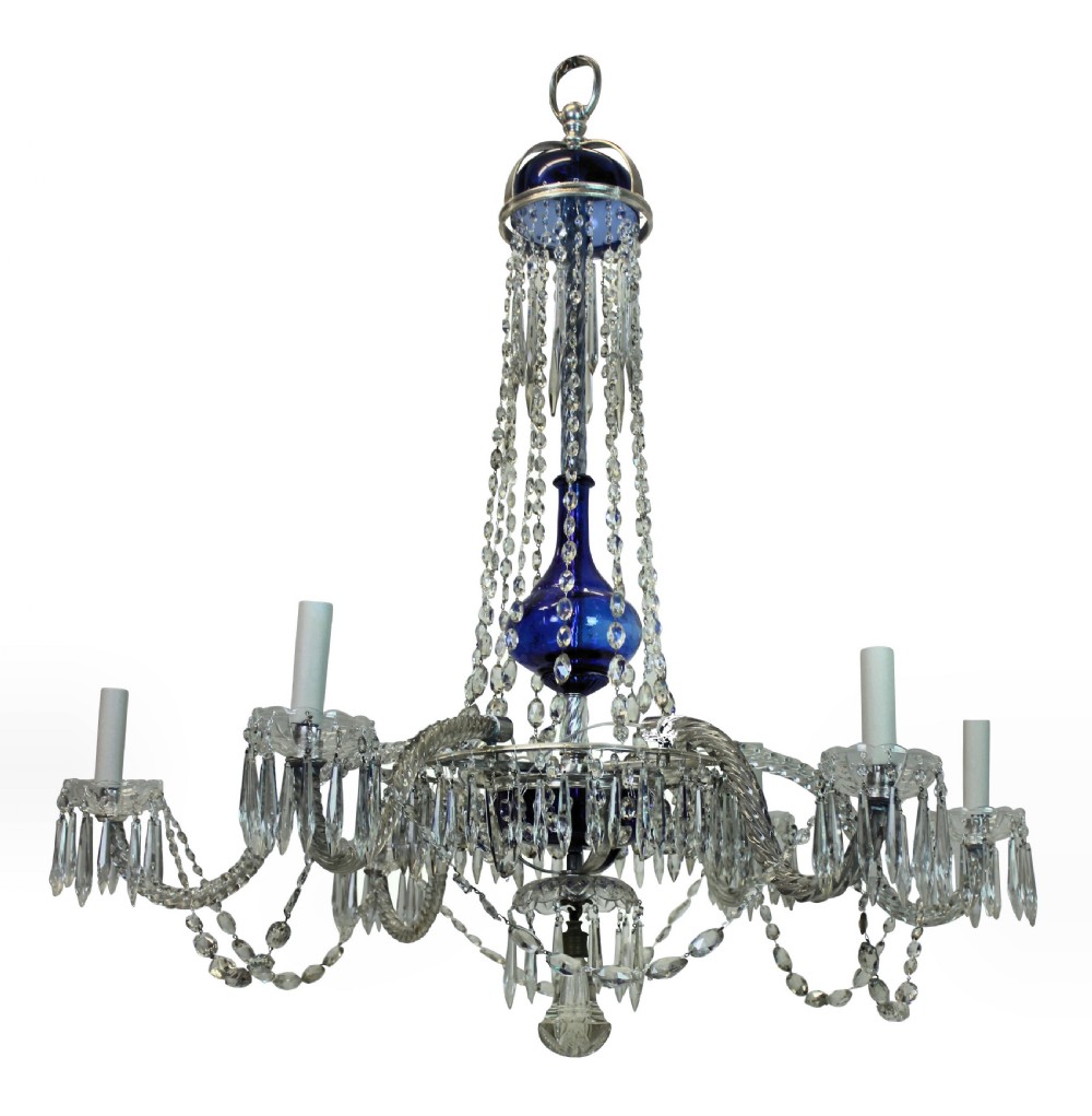 A nineteenth-century Swedish six-arm chandelier featuring clear cut-crystal prisms and hanging droplets arranged around a cobalt blue glass central column.