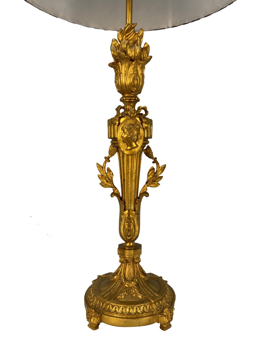 A pair of French Louis XVI style gold ormolu candlestick table lamps with gathered blue and cream patterned shades. View III