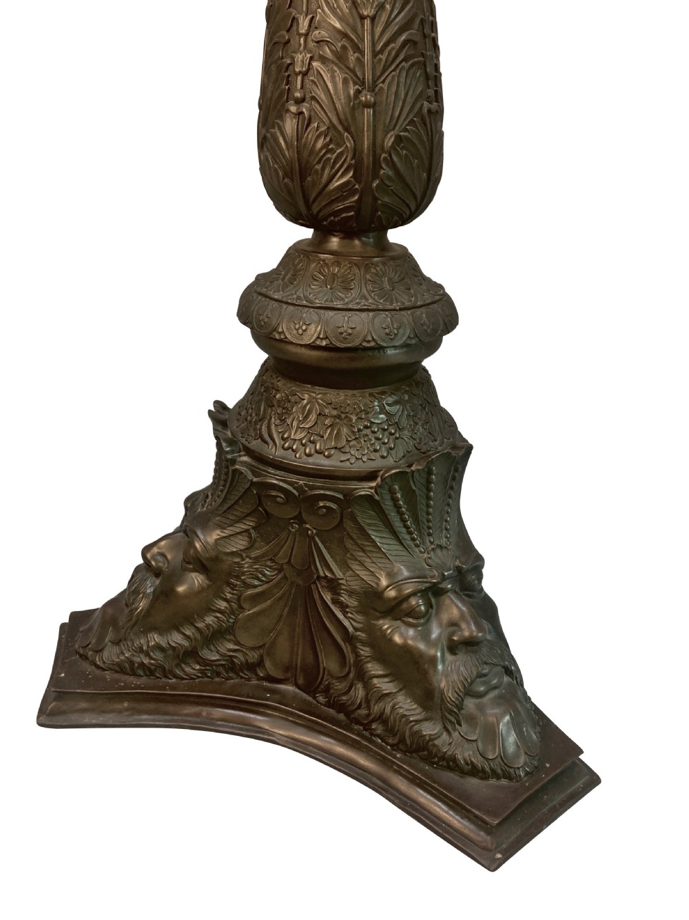 A pair of tall dark bronze Venetian torchere pedestals featuring ornate relief facial masks at the base, leaf-carved columns, and perforated top rims. View III