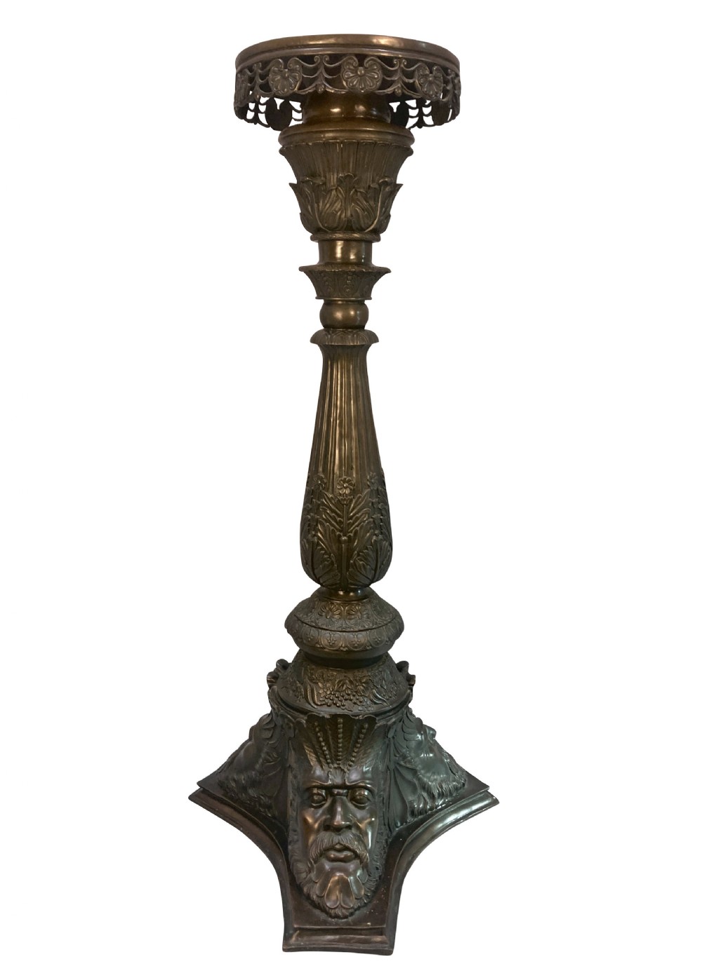 A pair of tall dark bronze Venetian torchere pedestals featuring ornate relief facial masks at the base, leaf-carved columns, and perforated top rims. View VI