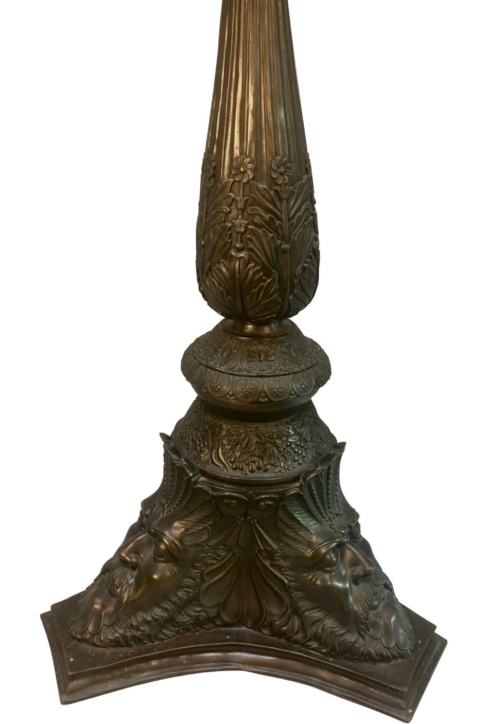 A pair of tall dark bronze Venetian torchere pedestals featuring ornate relief facial masks at the base, leaf-carved columns, and perforated top rims. View IX
