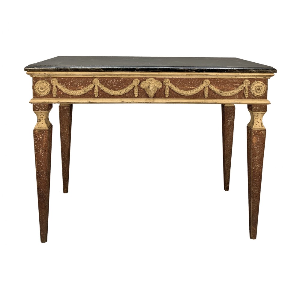 An 18th-century Italian Neoclassical console table featuring a dark marble top, square tapered legs, and a painted apron decorated with carved draped garlands.