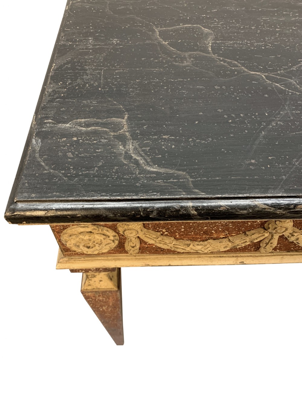 An 18th-century Italian Neoclassical console table featuring a dark marble top, square tapered legs, and a painted apron decorated with carved draped garlands. View VIII
