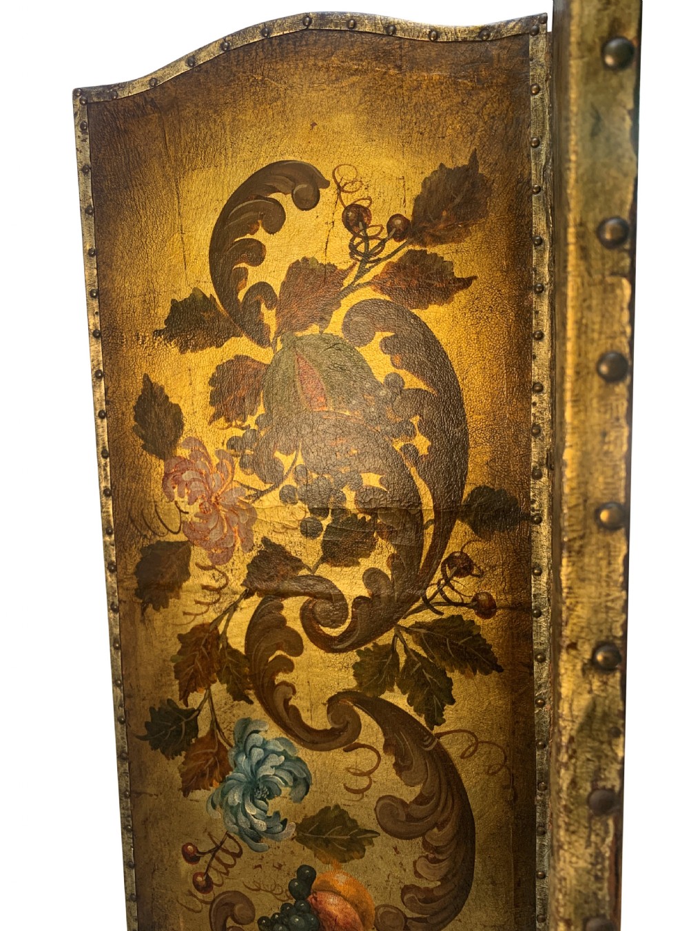 An eighteenth-century four-panel folding screen featuring embossed and hand-painted gilt leather decorated with botanical scrollwork, birds, and fruit, bordered with brass studs. View IV