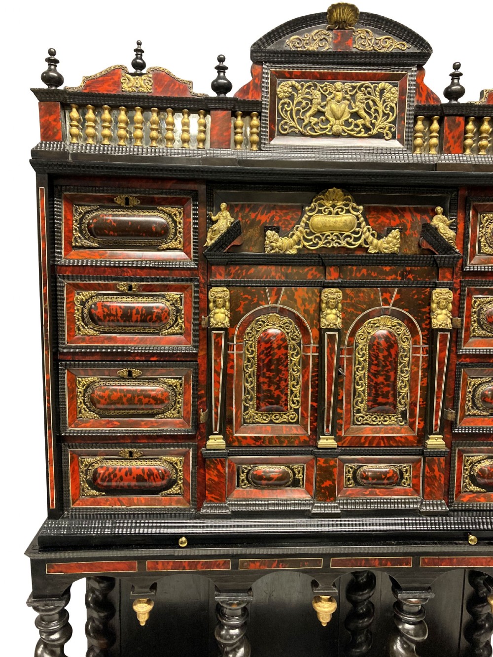 A 17th-century Flemish architectural cabinet on stand featuring red tortoiseshell veneered drawer fronts, gilt bronze mounts, and six ebonised barley-twist legs. View IV