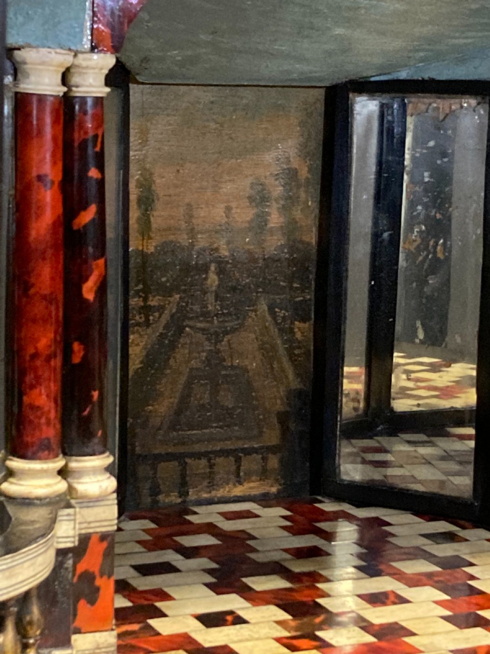 A 17th-century Flemish architectural cabinet on stand featuring red tortoiseshell veneered drawer fronts, gilt bronze mounts, and six ebonised barley-twist legs. View XIII