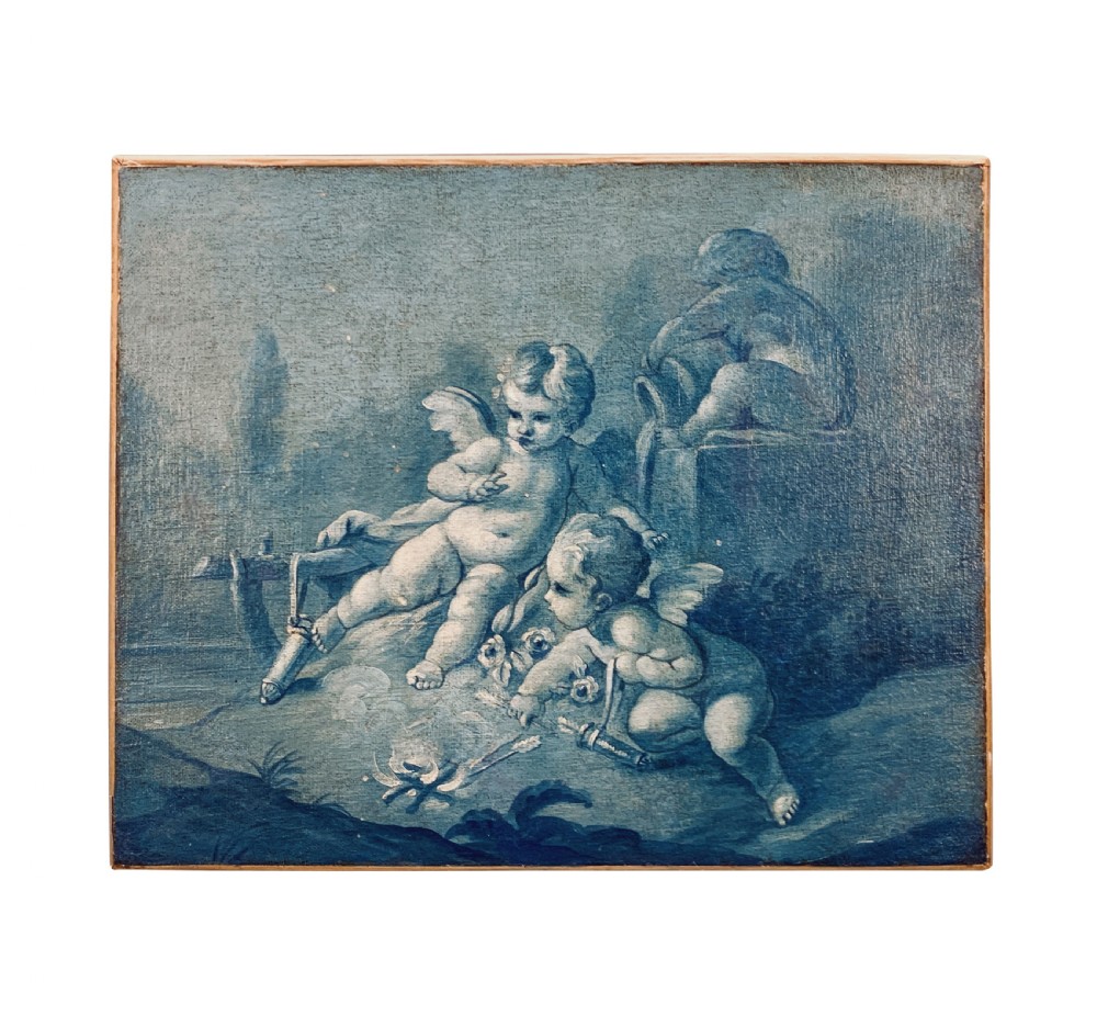 An eighteenth-century monochrome blue oil painting depicting winged cherubs gathered around a small fire within a classical landscape.