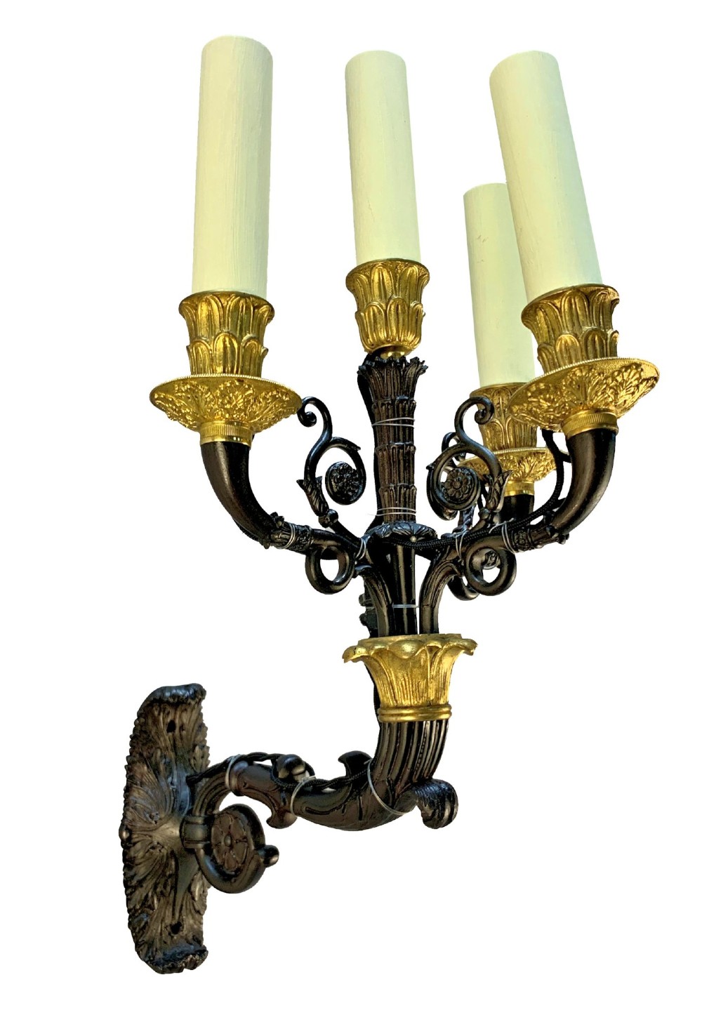 A pair of French Empire style wall lights featuring dark patinated bronze curved branches with four gilt bronze candle sockets each. View II