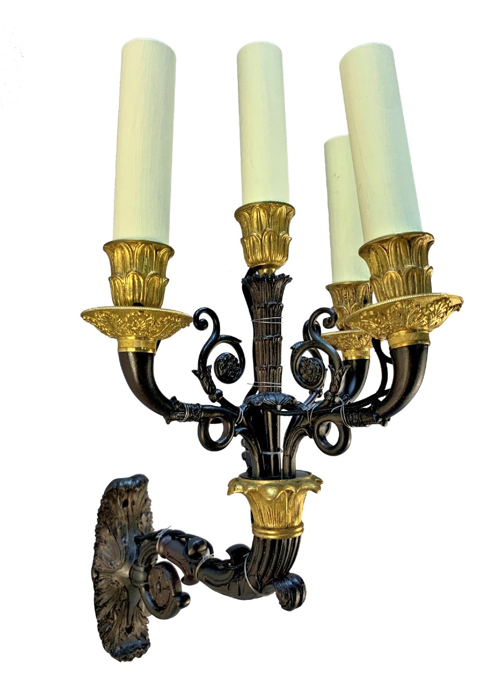 A pair of French Empire style wall lights featuring dark patinated bronze curved branches with four gilt bronze candle sockets each. View VI