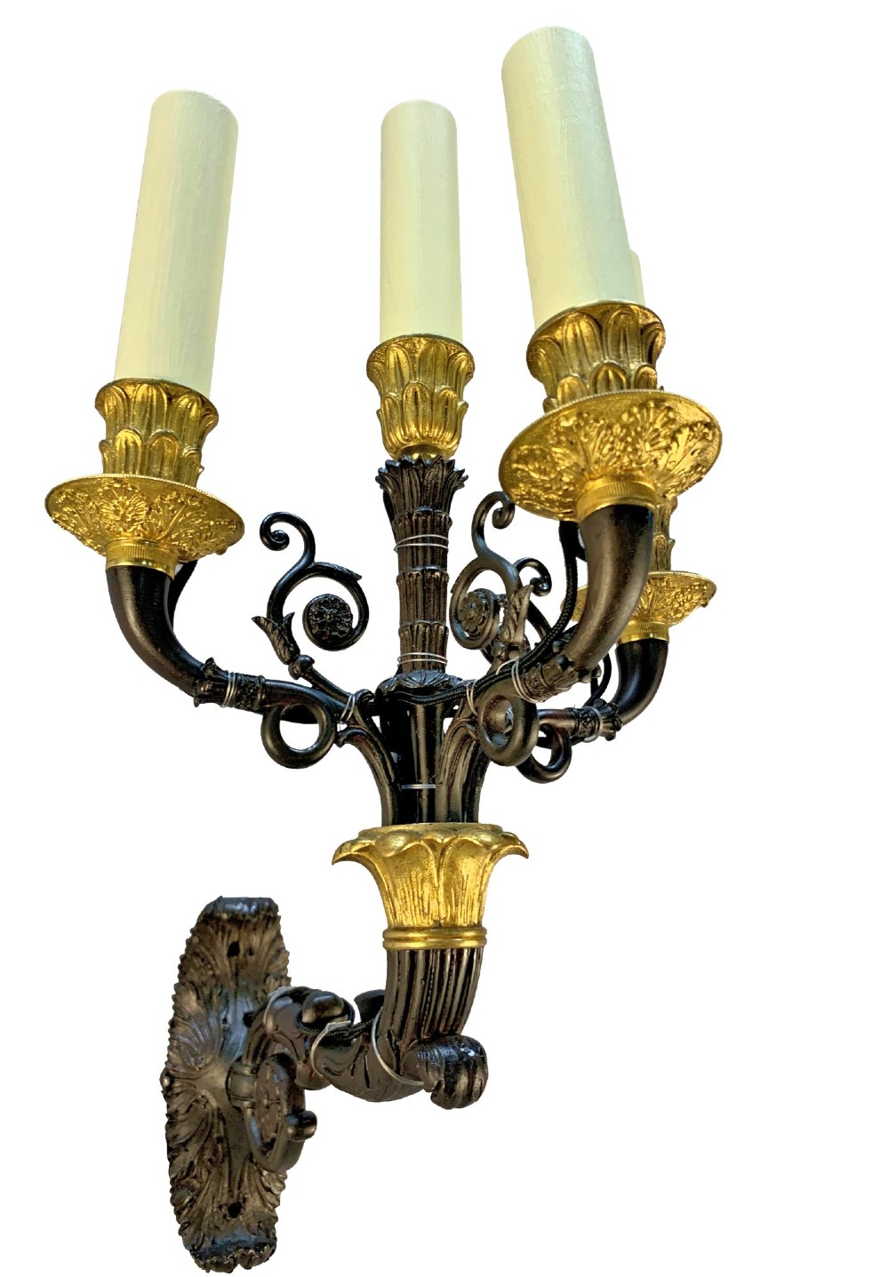 A pair of French Empire style wall lights featuring dark patinated bronze curved branches with four gilt bronze candle sockets each. View VII