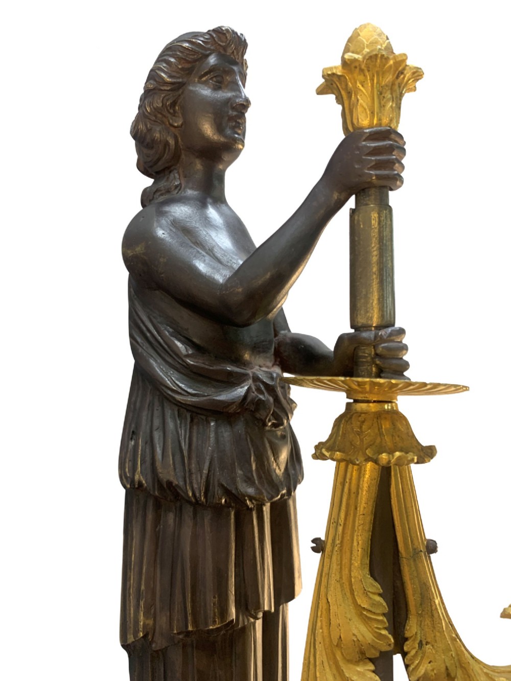 A pair of Neoclassical wall lights featuring dark patinated bronze female caryatid figures holding gilt bronze multi-arm candle holders with urn nozzles. View VI