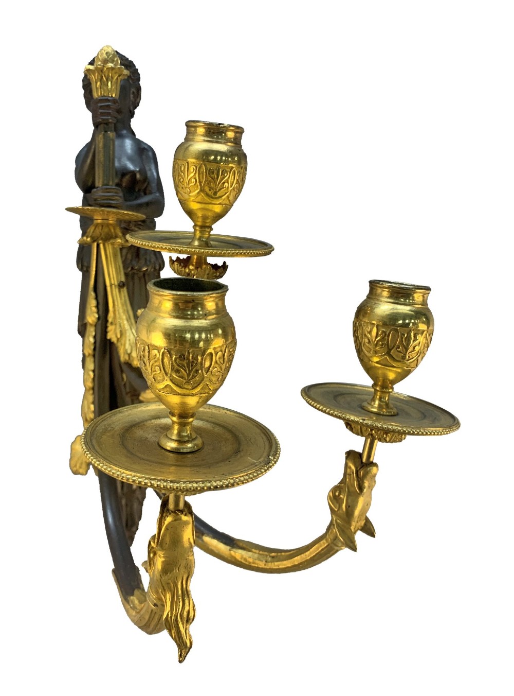 A pair of Neoclassical wall lights featuring dark patinated bronze female caryatid figures holding gilt bronze multi-arm candle holders with urn nozzles. View VII
