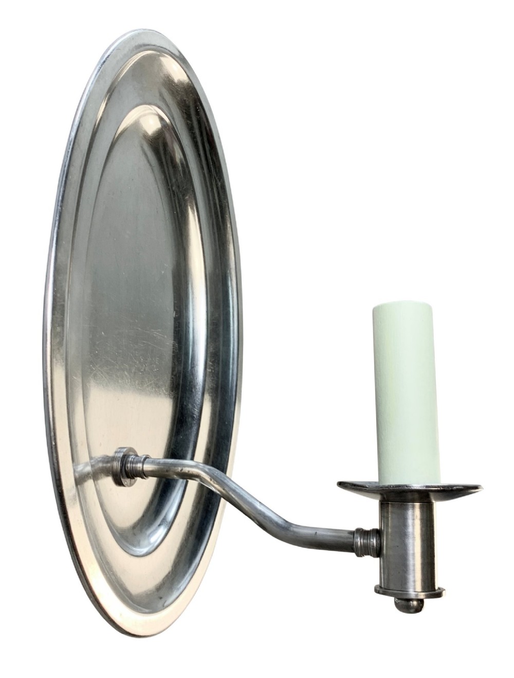 A set of six oval silver-plated single-arm wall sconces featuring reflective backplates and candle-style light sockets. View IV