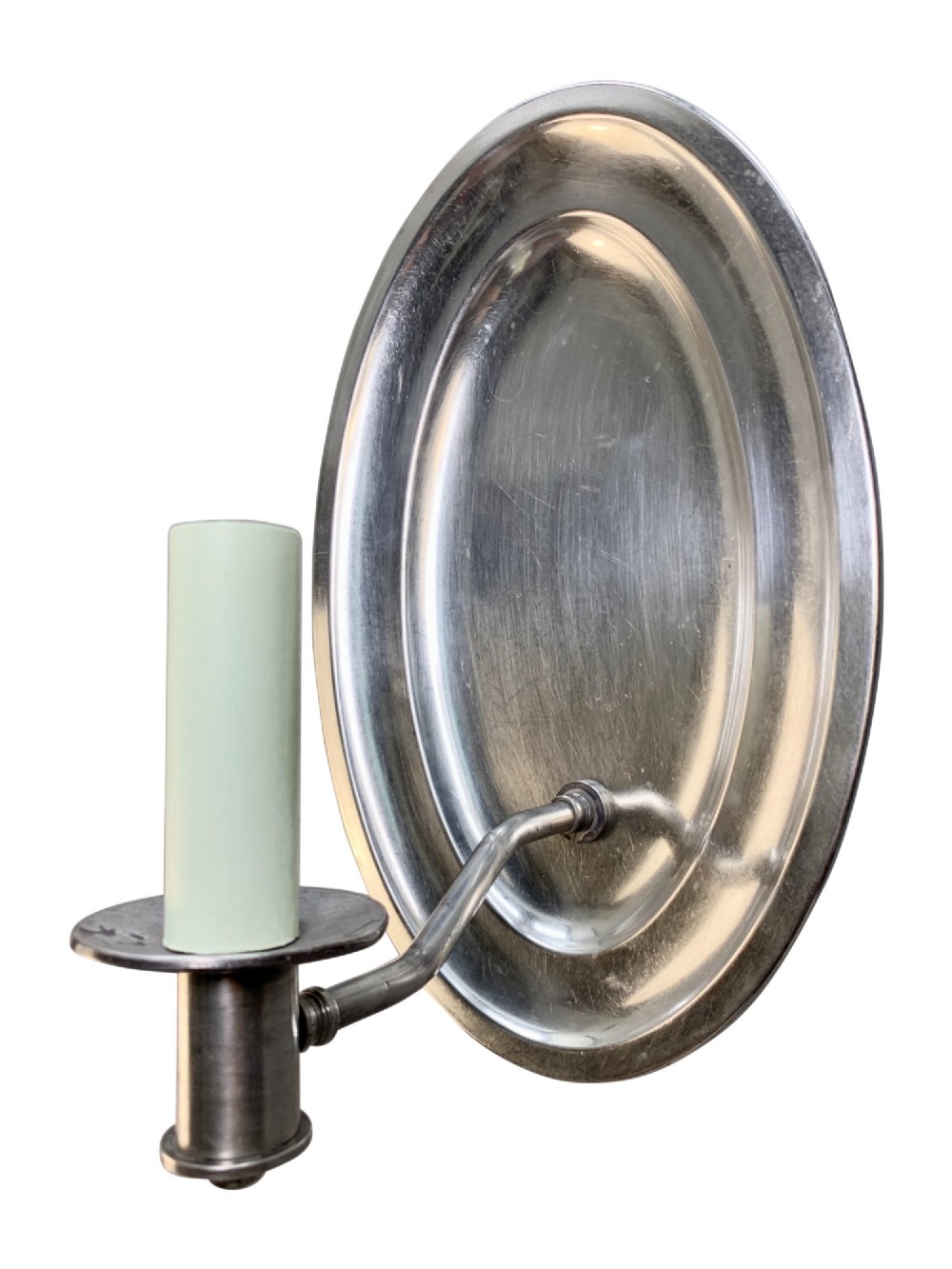 A set of six oval silver-plated single-arm wall sconces featuring reflective backplates and candle-style light sockets. View VIII