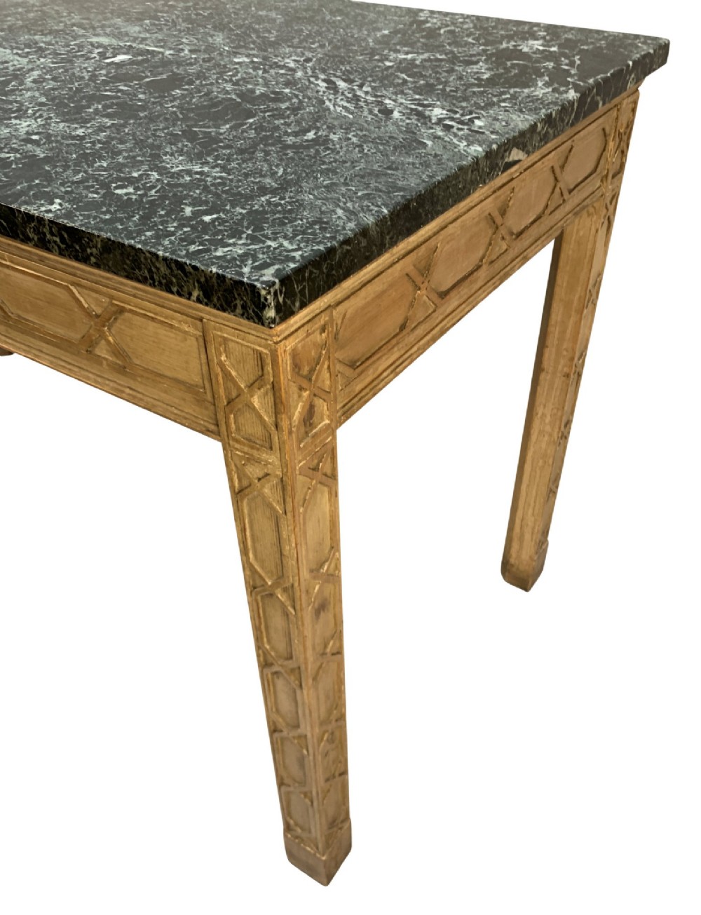 A pair of George III style natural pine console tables featuring carved geometric lattice friezes and dark green marble tops. View VII