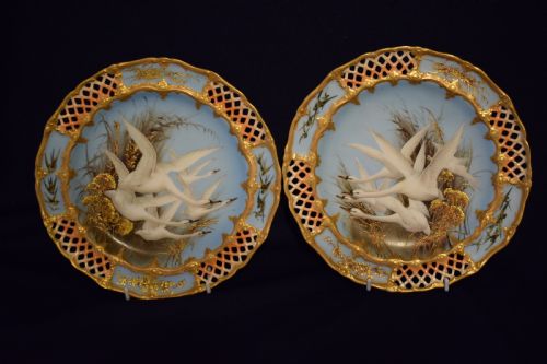 ROYAL WORCESTER PAIR OF PIERCED CABINET PLATES BY CHARLES BALDWYN