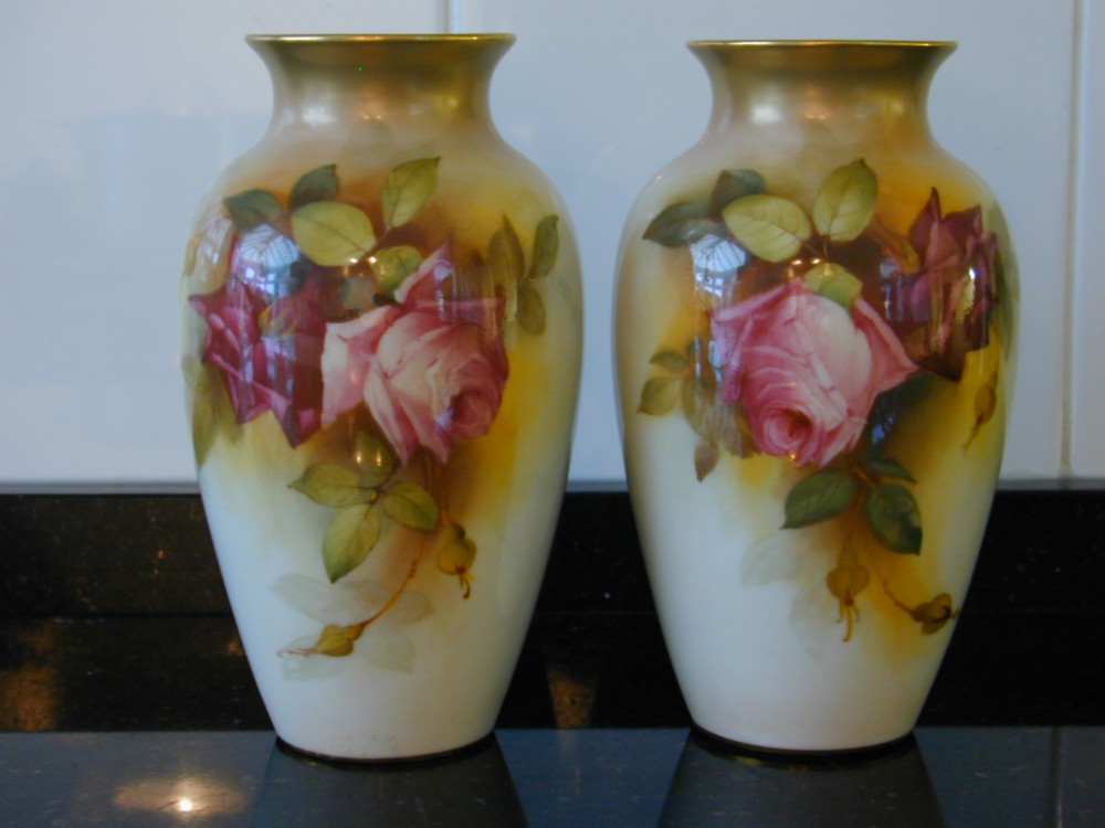 Royal Worcester pair of Artist signed vases decorated roses by W H Austin.