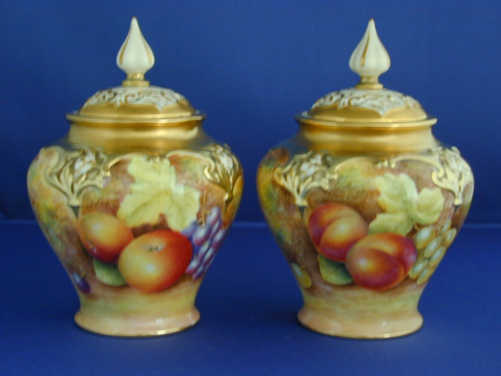 Matching pair of Royal Worcester fruit painted Artist signed pot pourri vases