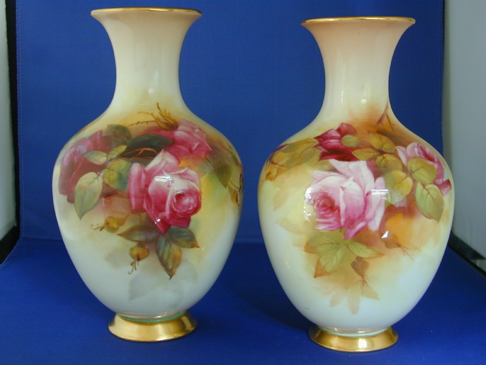 Royal Worcester pair of artist signed vases painted roses. 