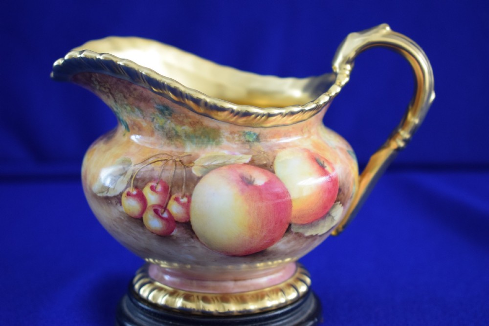 Royal Worcester fruit painted cream jug, rope edge, artist signed.