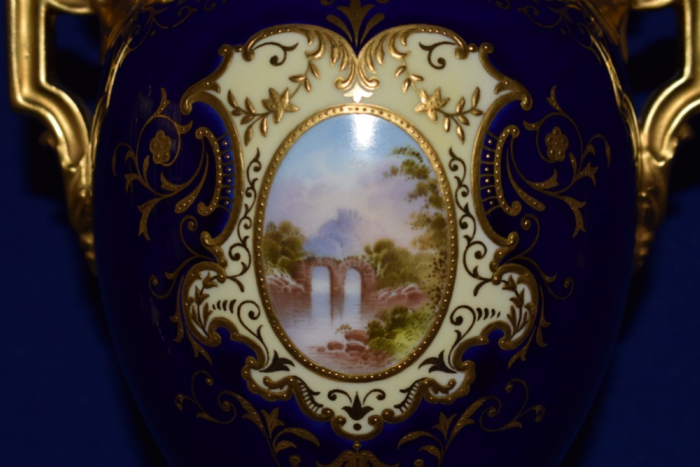 Coalport  pair of hand painted vases and covers View IV