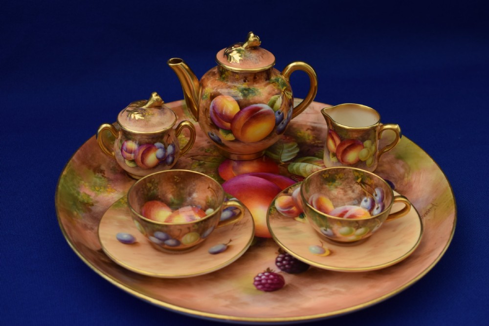 Royal Worcester miniature tea set painted fruit, all signed.