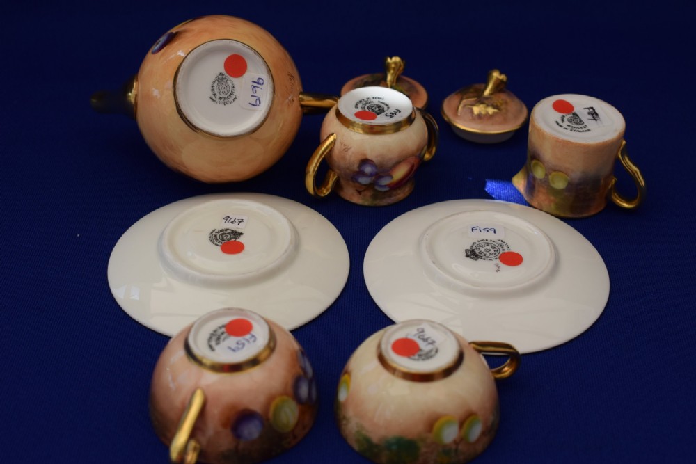 Royal Worcester miniature tea set painted fruit, all signed. View VI
