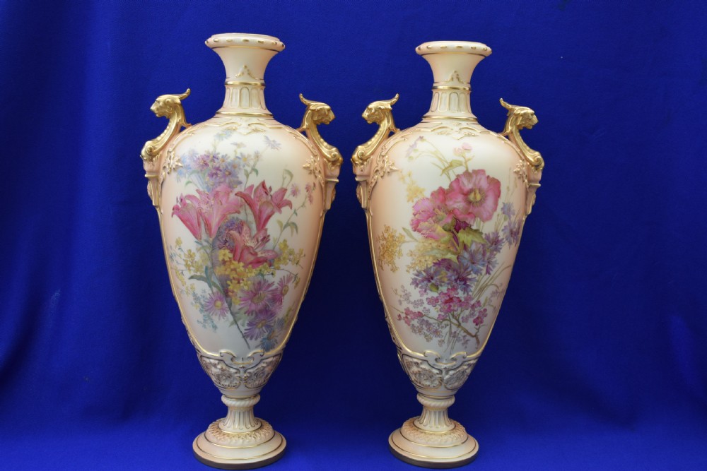 Royal Worcester large pair of blush ivory vases with floral decoration.