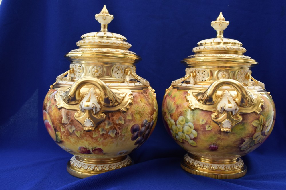 A pair of Royal Worcester painted fruit bow vases and covers View III