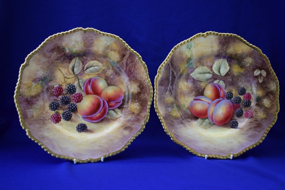 Pair of Royal Worcester large size dinner plates painted fruit 10.75