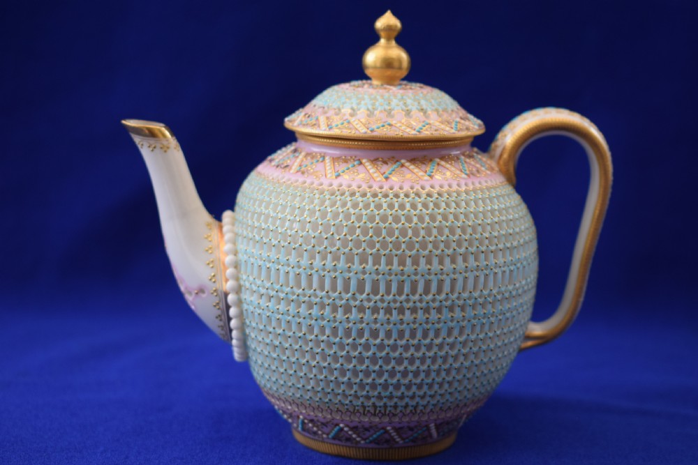 An exceptional Royal Worcester reticulated teapot and cover by George Owen.