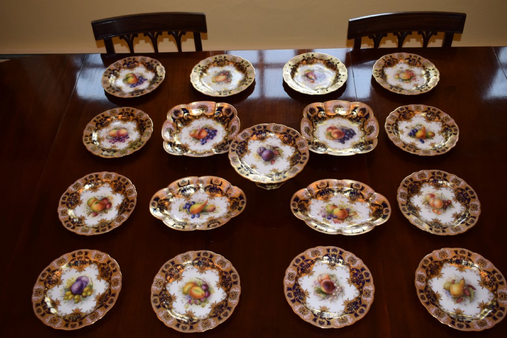 Royal Worcester artist signed 17 piece dessert service painted fruit.